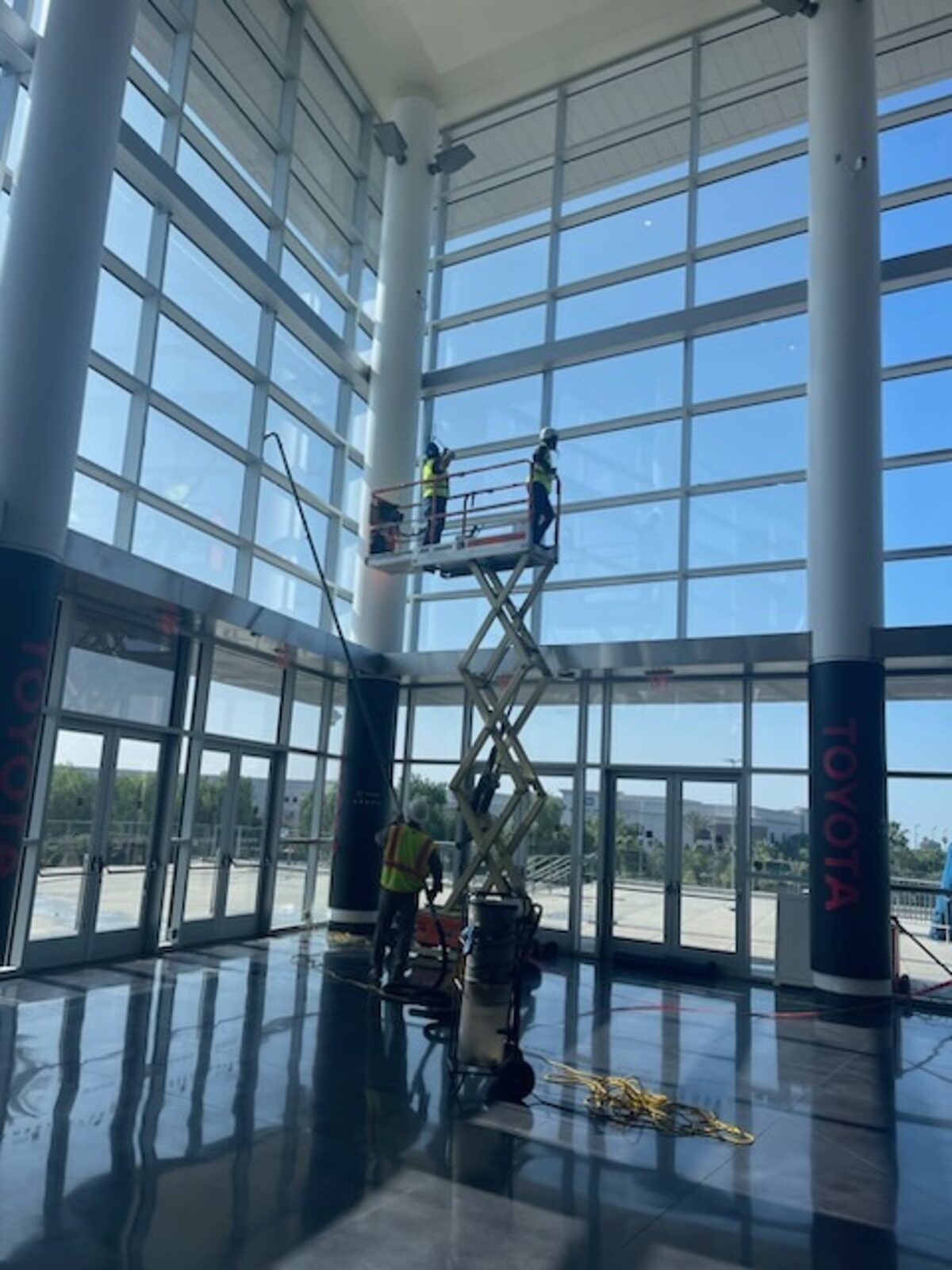 Lift work inside a glass atrium
