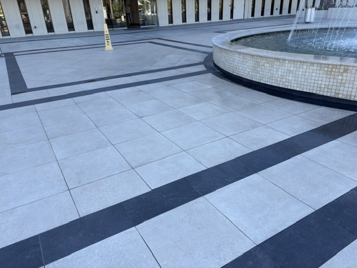 Freshly washed plaza around a fountain