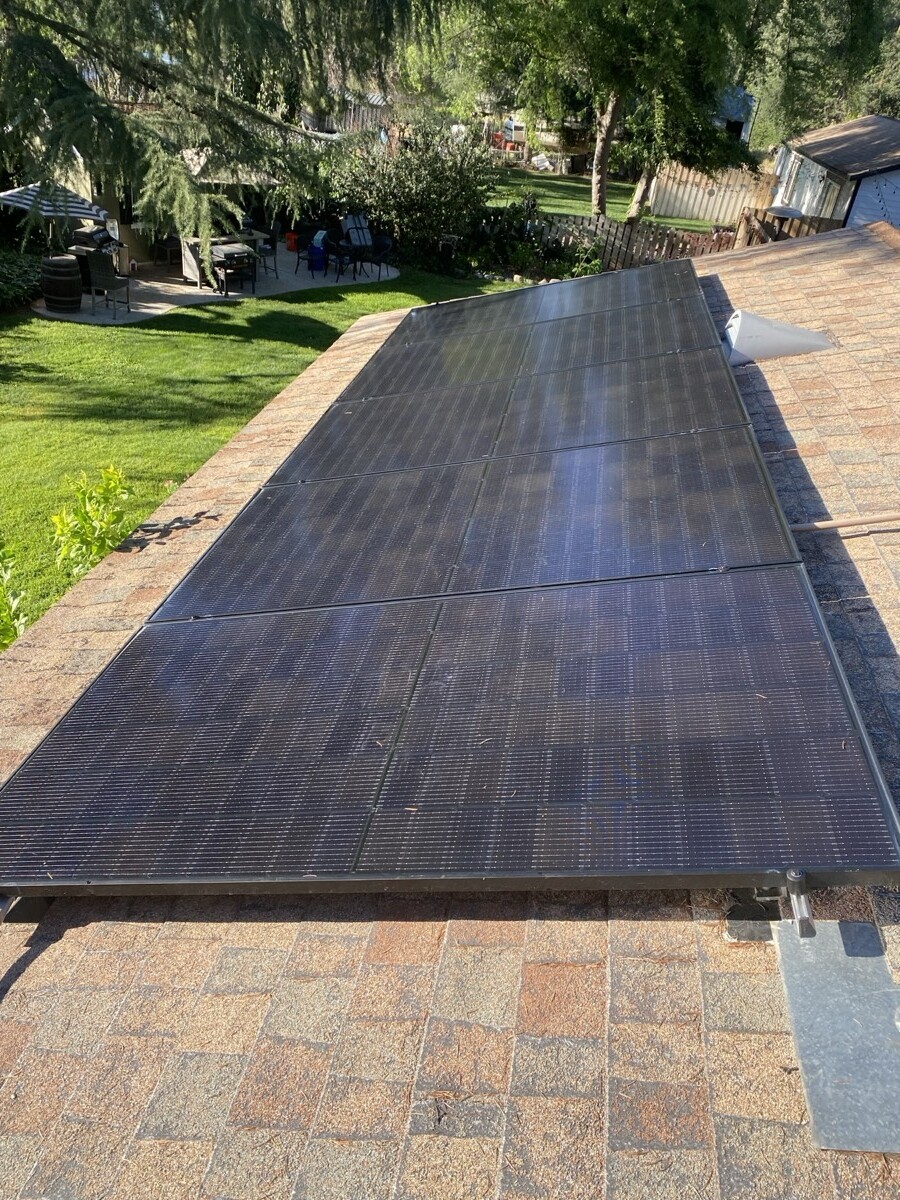 Clean solar array on a clay-tile roof